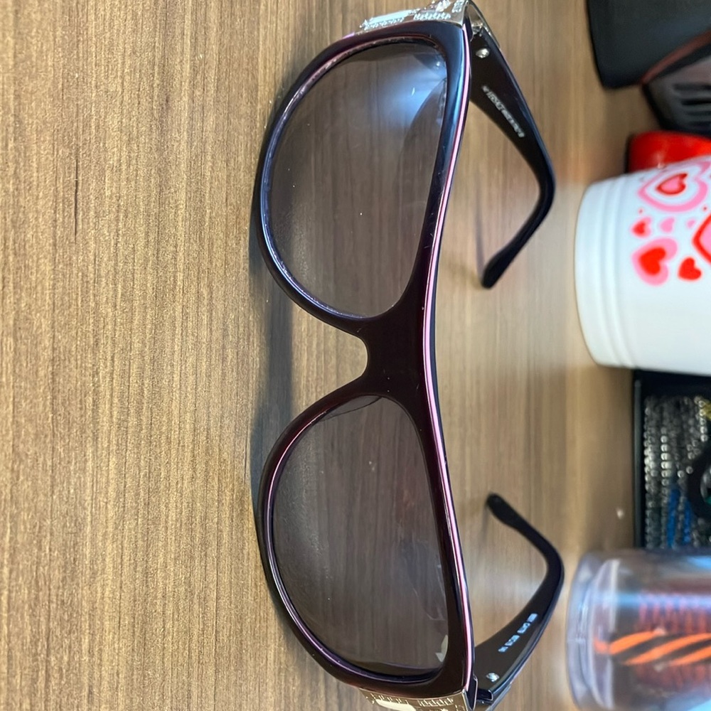 Versace sunglasses barely worn. Very good condition.  Left eye a small scrach.